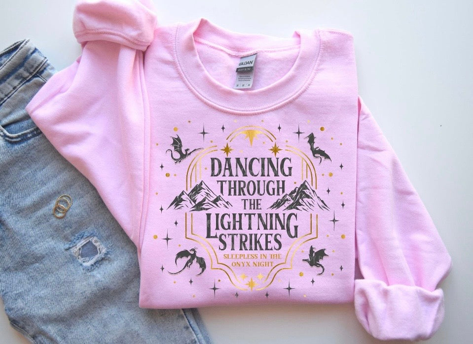 Dancing through the lightning strikes Crewneck