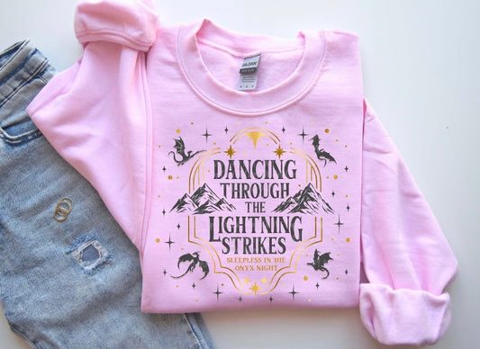 Dancing through the lightning strikes Crewneck