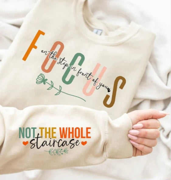 Focus on the step-in front of you crewneck with sleeve detail