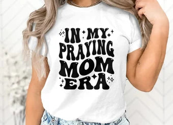 In my praying mom era tee